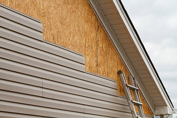 Professional Emergency Siding Repair technician working in Clarksburg, OH